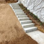 Création de place de parc enrochements et escalier d’accès – Romainmôtier